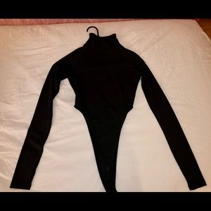 Black turtle neck bodysuit with open sides